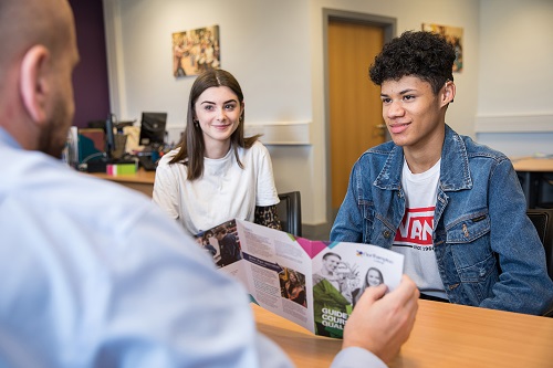 Student and teacher discussing