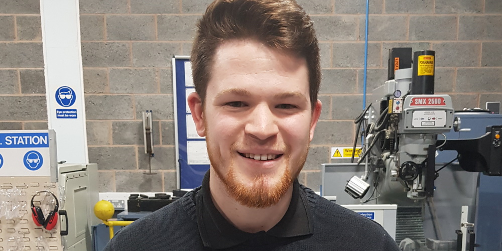 Image of Benjamin in the Engineering workshop at college.