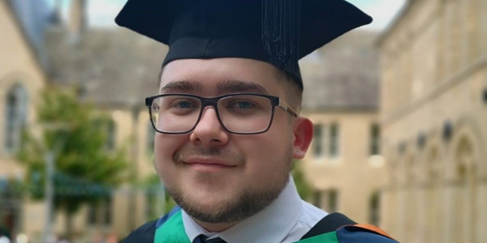 Photo of Jake at his university graduation.