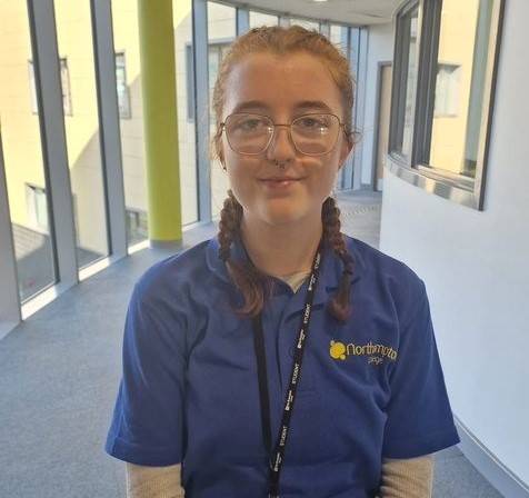 Skyelynda poses in her placement uniform.