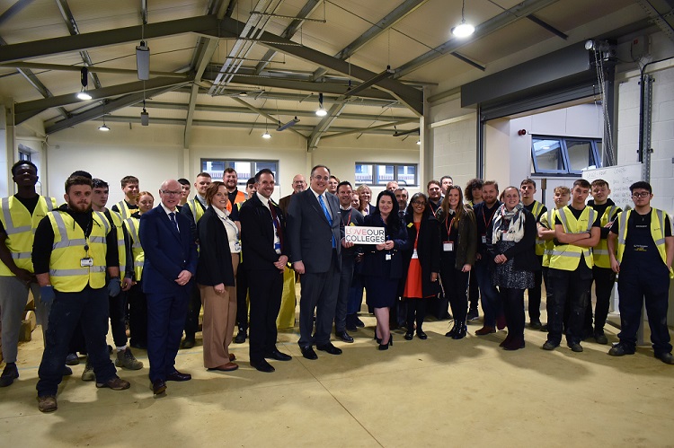 Staff, students and special guests pose in the new ACE Centre Extension.