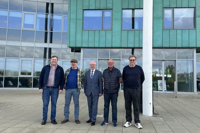 Lindon Morris, Tony Metcalfe, Patrick Leavey, Martin Watford, Paul Howard outside Northampton College's main reception.