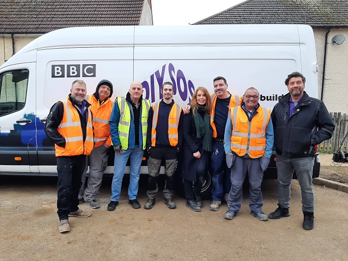 Construction students pose with Nick Knowles and the DIYSOS team