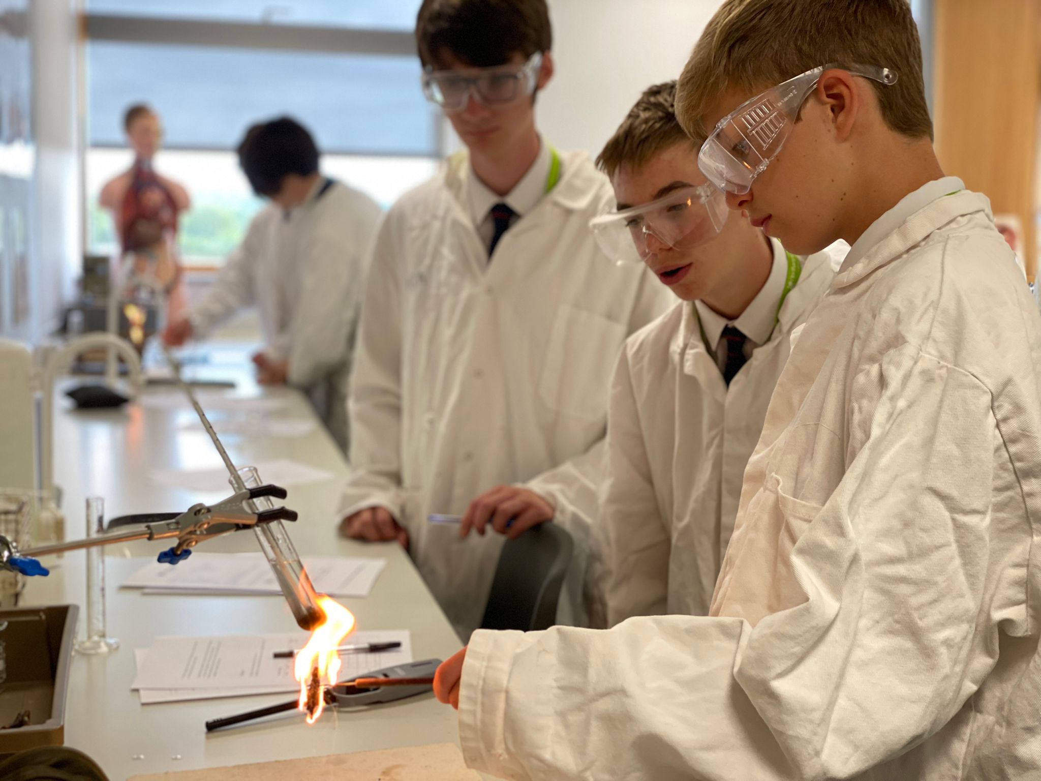 Students taking part in a science experiment as part of 'Supporting Sustainable Futures'