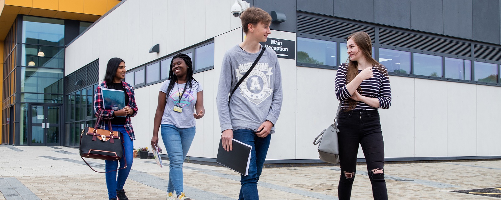 Students at the entrance to our Daventry Campus.