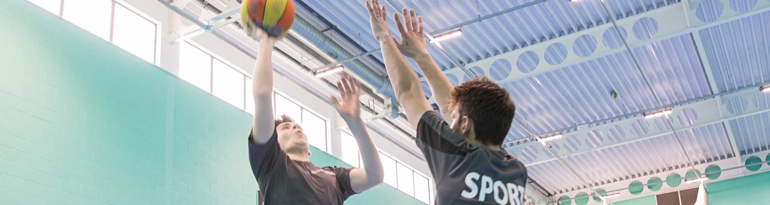 Image of students playing basketball.