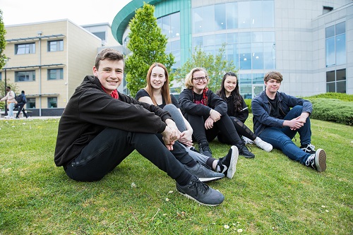 Students sat together in the College courtyard